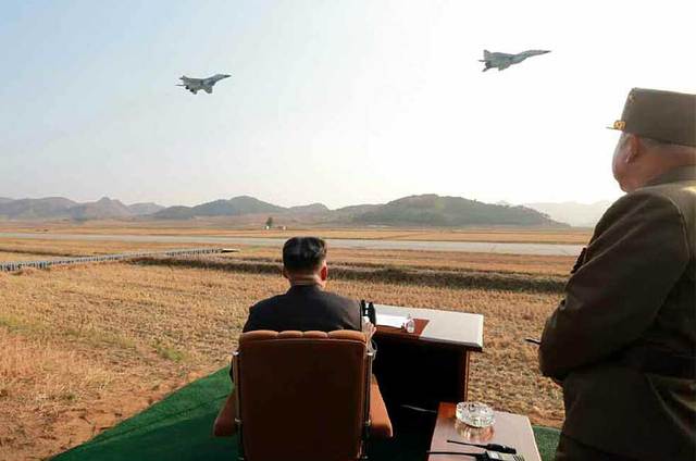 金正恩指导朝鲜飞行员训练 登米格-29战机(组图)