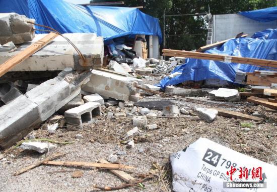 美国南方暴雨洪灾18死30失踪 奥巴马承诺联邦支援