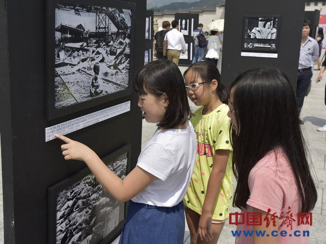 百余张抗战历史图片首尔展出 韩国老人讲述日军罪行