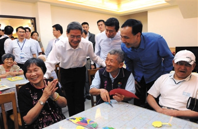 张志军台湾“走基层”一日访四地亲民作风受欢迎