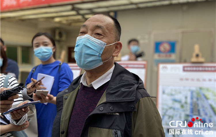 （是上着锁的自来水龙头）告别旧“道北”  西安棚户区改造托起安居梦