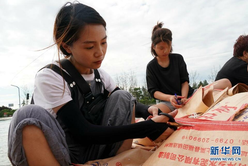 鹤壁浚县：众人携手共筑堤坝