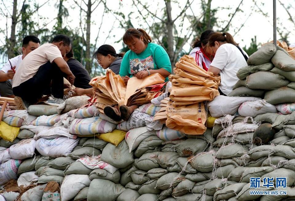 鹤壁浚县：众人携手共筑堤坝