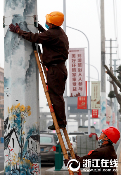 台州路桥：电线杆披上“五彩衣”