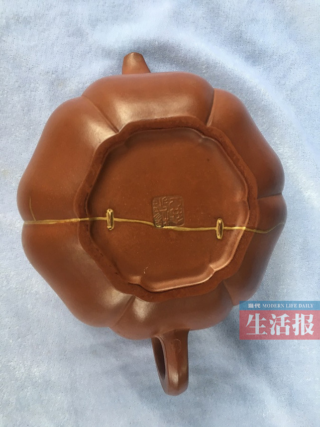 [焦点图]他巧手“缮物”：金缮锔瓷尽显缝合之美