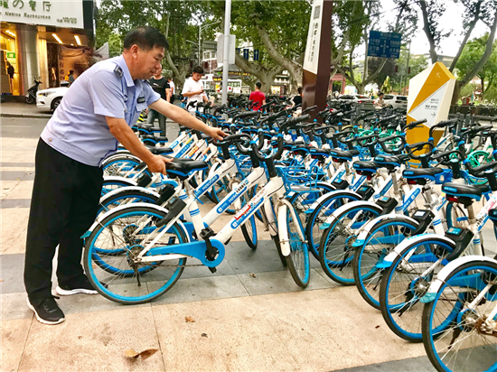 （供稿 交通运输列表 三吴大地南京 移动版）探索长效化管理机制 南京城管提共享出行新思路