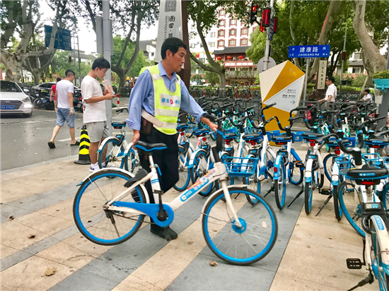 （供稿 交通运输列表 三吴大地南京 移动版）探索长效化管理机制 南京城管提共享出行新思路