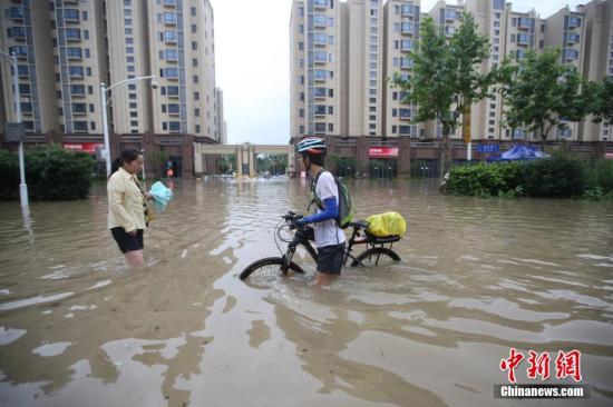 长江中下游汛情持续 多地开始防汛实战