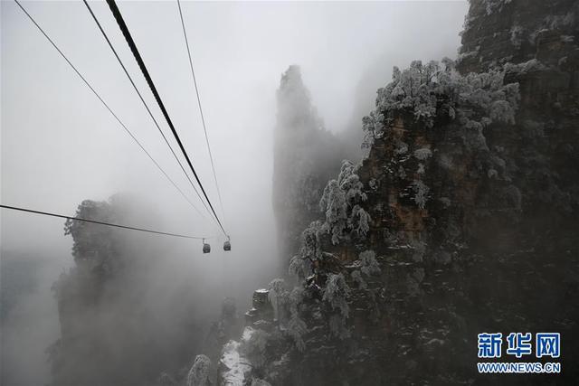 湖南张家界：冰雪云海入画来