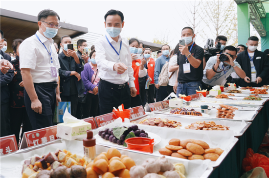 信阳市息县举行庆祝2022年中国农民丰收节暨第三届豫道·东岳红红薯节_fororder_图片5