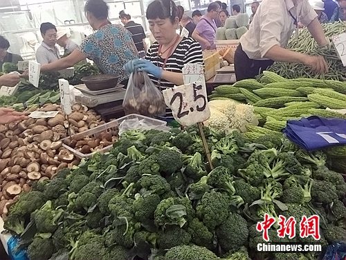 强降雨致十余省份菜价上涨 多部委紧急部署保障供应