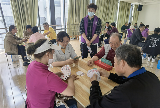 南京市栖霞区肢残人协会举行首届“江苏银行杯”掼蛋大赛_fororder_图片1