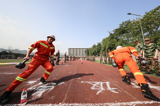 【法制安全】淬火百炼成铁军 大渡口消防举行春季练兵比武竞赛