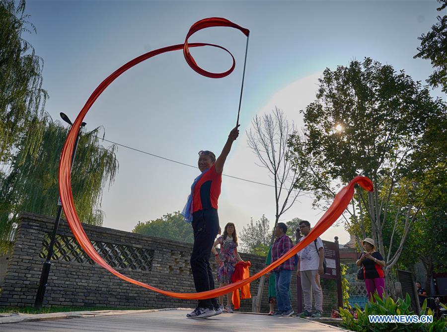 Journalists invited to visit Qianmen area in Beijing