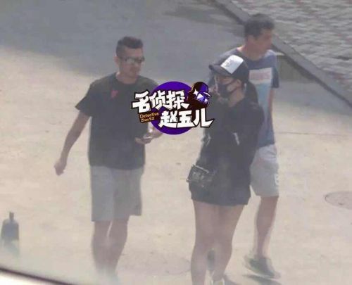 林丹出轨长腿辣妹 女方勾住林丹脖子亲热