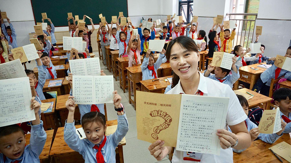 【焦点图】永川中小学生用上环保作业本