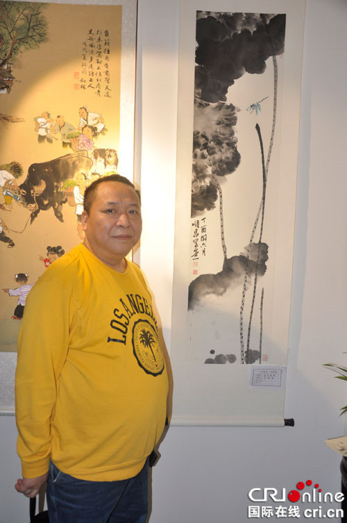 【CRI专稿 列表】 “四重喜庆”书画展在重庆开展 【内容页标题】70位艺术家书画作品喜迎国庆中秋  “四重喜庆”书画展在渝开展