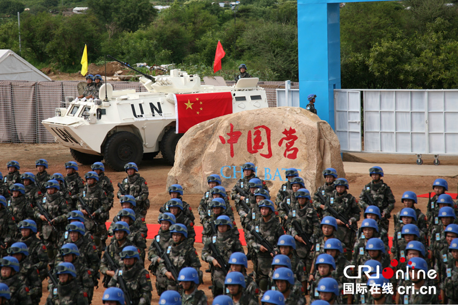 国际锐评：中国在发展中承担大国责任