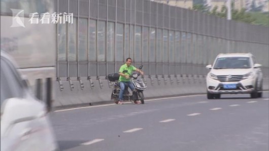 【区县新闻】闵行交警集中整治两轮车“上桥入隧”